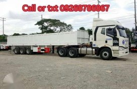 Brand new faw tractor head Low bed trailer and flat bed trailer