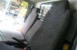 2004 Isuzu Elf 6-Wheeler Dropside Truck