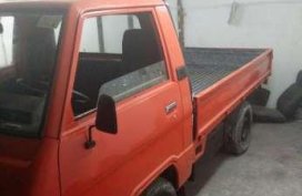 Well maintained Mitsubishi L300 Dropside Gas 1998 RED color for sale