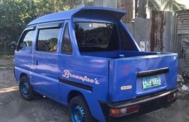 Blue Suzuki Multicab