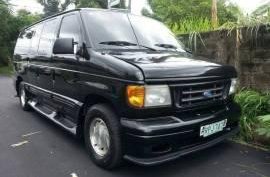 Ford E150 chatue auto