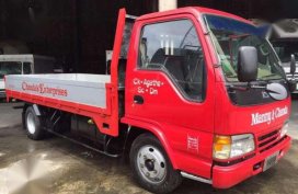  Isuzu Elf Dropside Giga 4hg114ft wide NPR for sale
