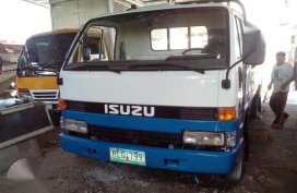 Isuzu Elf 14ft drop side with lifter