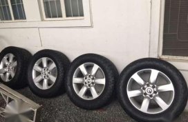 Nissan armada Pull out rims 20 with NEW Nitto terra grappler 305 55 20