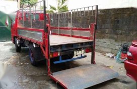 Isuzu Elf Dropside stainless with POWER LIFTER 10 ft. Single tire GIGA