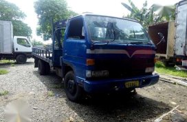 Isuzu Elf Dropside Boom Truck 2.5 Tons