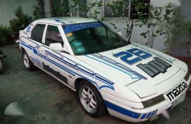 Mazda Astina 1.3 MT White For Sale