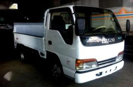Isuzu Elf 6-Wheeler Dropside White MT 