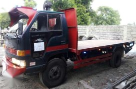 Isuzu Elf 150 14 Ft Red MT For Sale