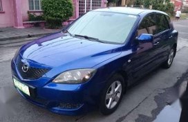 mazda 3 AT 05 very good on gas easy to drive easy to park smooth