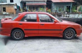 Mazda 323 1995 MT Red Fpr Sale