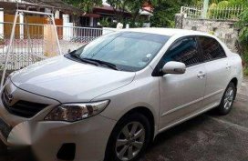 Toyota Corolla Altis 2013 White MT For Sale