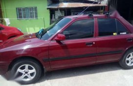 Mazda 323 97 model in good condition for sale