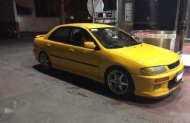 Mazda Familia 323 1997 Yellow AT For Sale