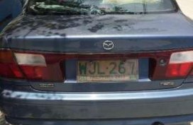 mazda 323 familia rayban matic 99 model