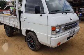 2015 L300 FB dropside flatbed w aircon 7tkms only