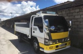 Isuzu Elf 12ft 4HL1 MT White Truck For Sale