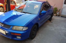 Mazda 323 1997 sedan blue for sale 