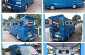 Multicab Suzuki passenger type blue and Pink and Nissan urvan Estate