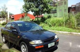 Mazda 323 Glxi Rayvan 1997 MT Black For Sale