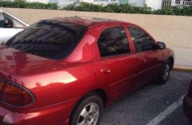 Mazda Sedan Gas red for sale 