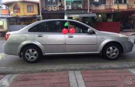 Chevrolet 2005 Optra sedan silver for sale 