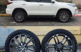 Fortuner oem wheels 20 inch Tri Ace Pioneer AT 1 tires 265 50 20