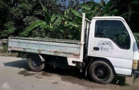 Isuzu NHR Dropside truck for sale 