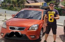Kia Rio 2010 1.4 AT Sunset Orange