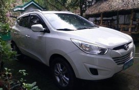 Hyundai Tucson 2010 THETA II A/T