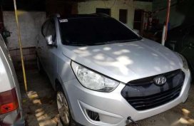 Hyundai Tucson crdi diesel engine automatic transmission.