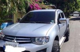 Mitsubishi strada silver for sale