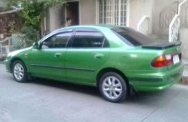 Selling my Mazda 323 Familia 97 Mdl for sale 