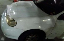 Kia Carnival 2000 AT White Van For Sale 