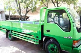 Isuzu Elf Dropside GIGA for sale 