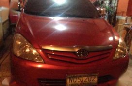 Toyota Innova j 2010 Van red for sale 