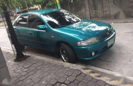 Mazda 323 Familia 1997 MT Green For Sale 