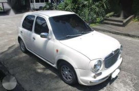 Nissan Verita vs Picanto i10 eon aveo spark beetle mini cooper getz