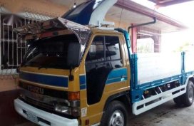 Isuzu Elf 4HF1 2002 MT Truck Yellow For Sale 