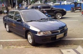 Lancer GLXI 99 AT tiptronic pizza