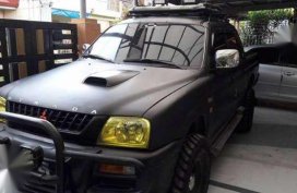 Mitsubishi Strada 2002 4WD 2.5 MT Gray For Sale 