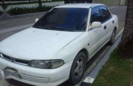 White Car-Mitsubishi Lancer 1995 mdl for sale 