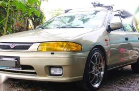 Fresh Mazda 323 AT Beige Sedan For Sale 