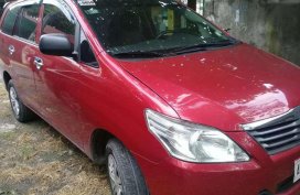 For sale red Toyota Innova