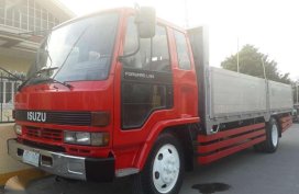 For sale Red Isuzu Forward dropside