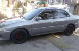 For sale silver Mitsubishi Lancer 2000 Model
