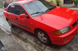 Mazda 323 Rayban 1.6 Efi 1997 MT Red For Sale 