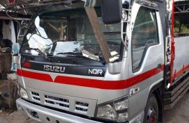 Isuzu Elf 4HE1 TURBO Silver Truck For Sale 