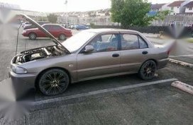 Mitsubishi Lancer 4G61 MT Brown Sedan For Sale 