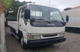 Isuzu Giga NPR Dropside 14ft White For Sale 